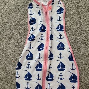 Zip up swaddle by woombie air